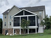 <b>Gable Style Roof on a Screened Porch with a side set of stairs to grade - Our goal is to make your new screened in porch look original to your home</b>